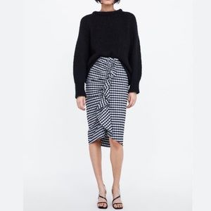 Plaid pencil skirt with frill details.